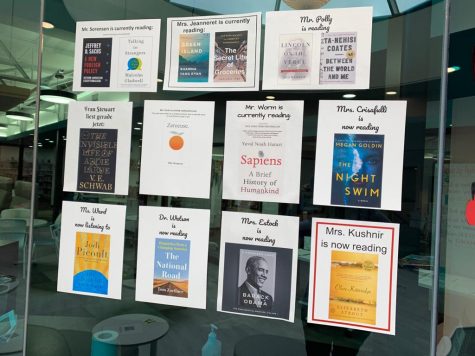 Images of the books that teachers are reading have been hung in the high school library windows.