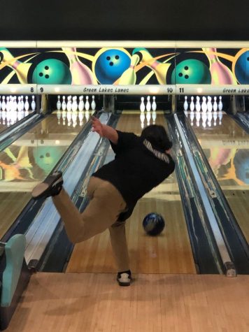 An FM bowling athlete attempts to pick up a spare.