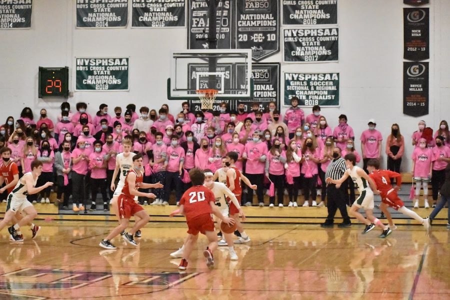 Pink+Out+fans+attempt+to+distract+the+opposing+team+from+the+end+bleachers.