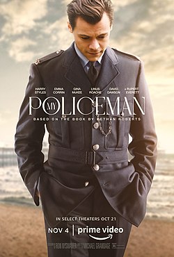 The promotional poster for the film shows Harry Styless character in police uniform standing in thought on the beach.
