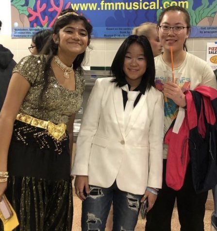 Students pose in the foyer after the show.