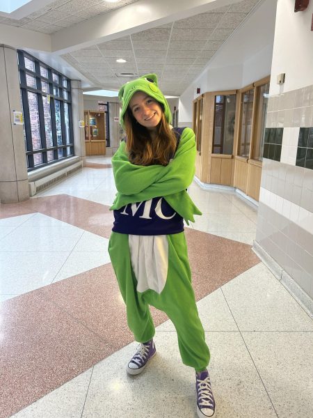 Danica poses in her green frog pajamas