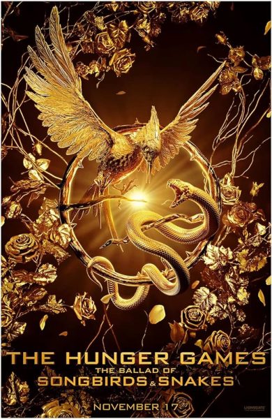 The movie poster features a golden mockingjay and serpent fighting within a ring surrounded by roses, set against a black background.