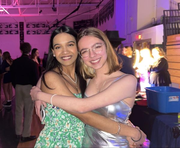 Two FM students embrace at the dance.