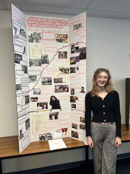FM student Lilly Meagher poses with her project.