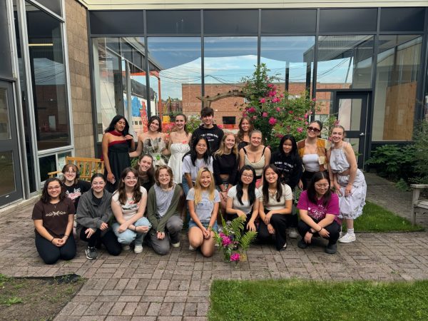 Members of FAME club pose in the foyer garden