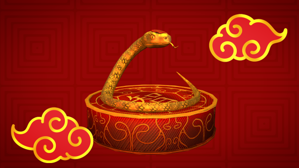 A golden snake rests coiled with head raised on a red ornate dias.