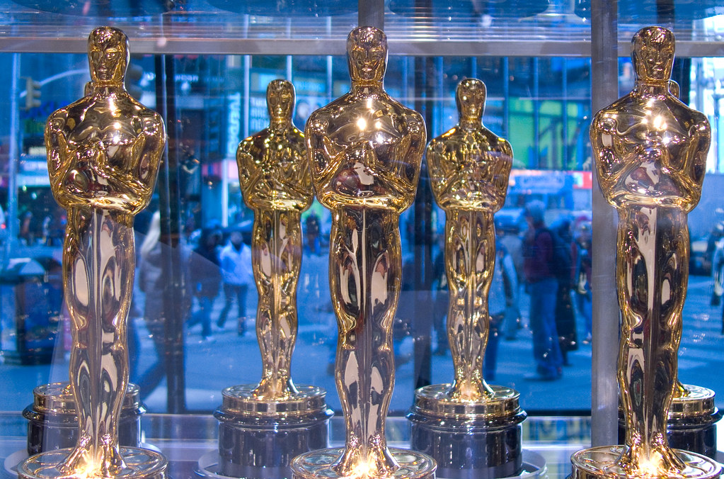 Oscar statues sit on a table in front of the exterior viewing windows at ABC studios in New York.