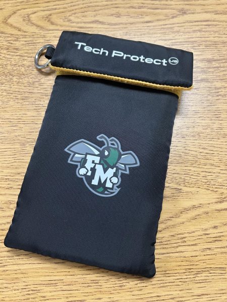 The black pouch has an FM Hornet logo and a velcro opening to insert the phone within the pouch.