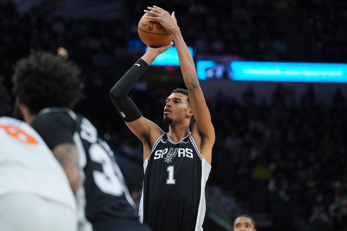 Dec 31, 2025; San Antonio, Texas, USA;  San Antonio Spurs forward Victor Wembanyama (1) shoots a free throw in the first half against the New York Knicks at Frost Bank Center. Mandatory Credit: Daniel Dunn-Imagn Images
