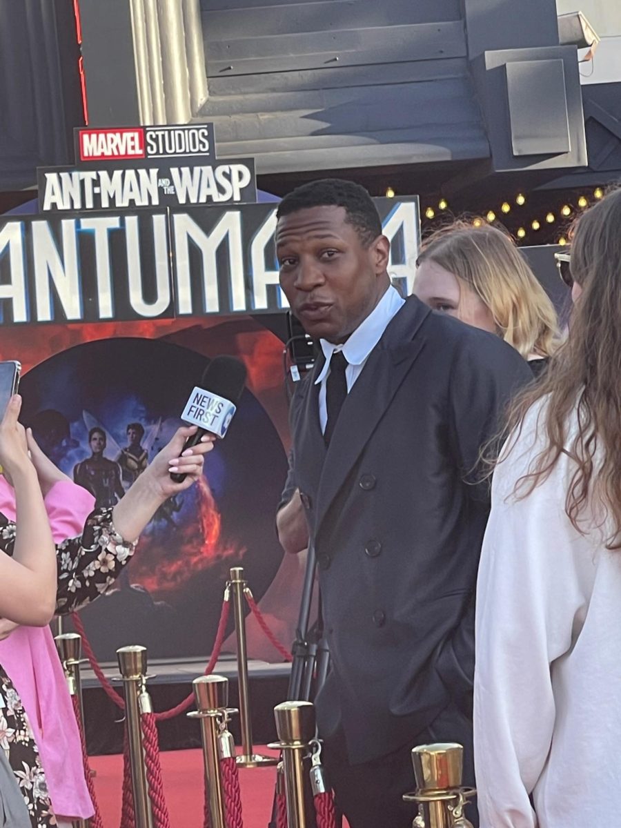 Jonathan Majors on the red carpet at a Marvel premier. Flickr